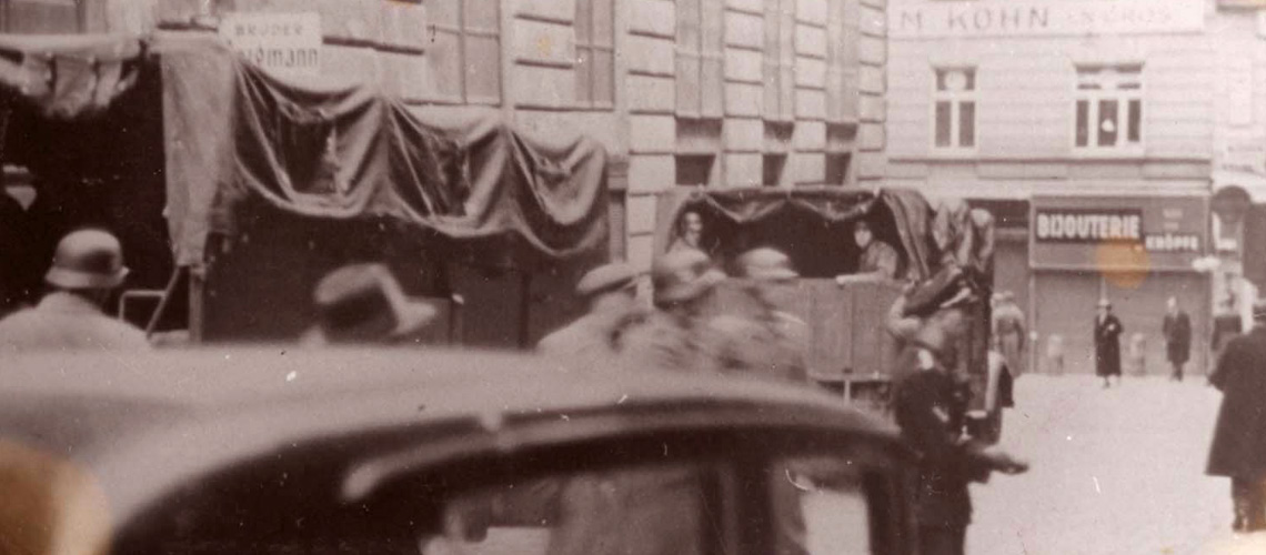 SS men standing next to the Stadttempel Synagogue in Vienna, which was desecrated and its interior badly vandalized during the Kristallnacht pogrom, 9-10 November 1938