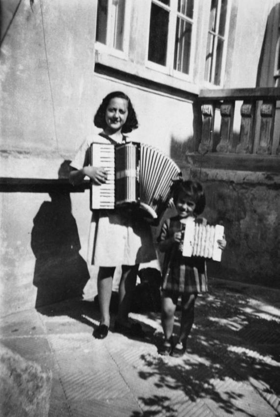 Rachel Ashkenkazi with her accordion (left)