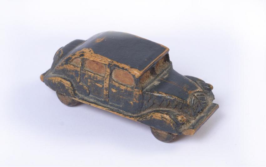 hand carved wooden cars