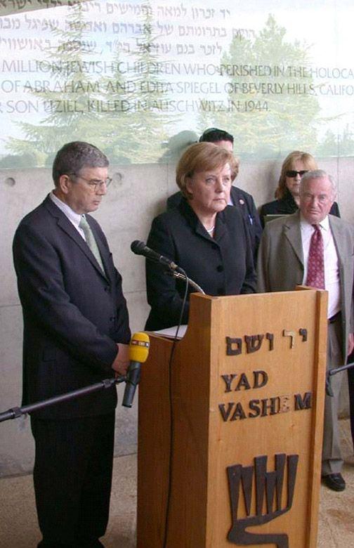 Dr. Merkel speaking after visiting the Children's Memorial