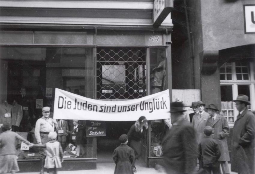 SA members block the entrance of the Jewish-owned Textile Shop L. Herz Sohn. Heilbronn, Germany, April 1 st , 1933