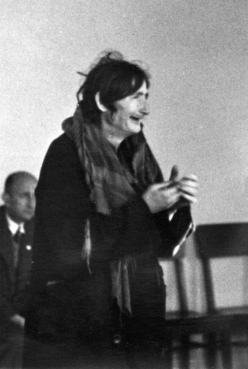 A Jewish woman being tried in a German courthouse in Szydłowiec for having left the ghetto without a permit. She was found guilty and sentenced to death.